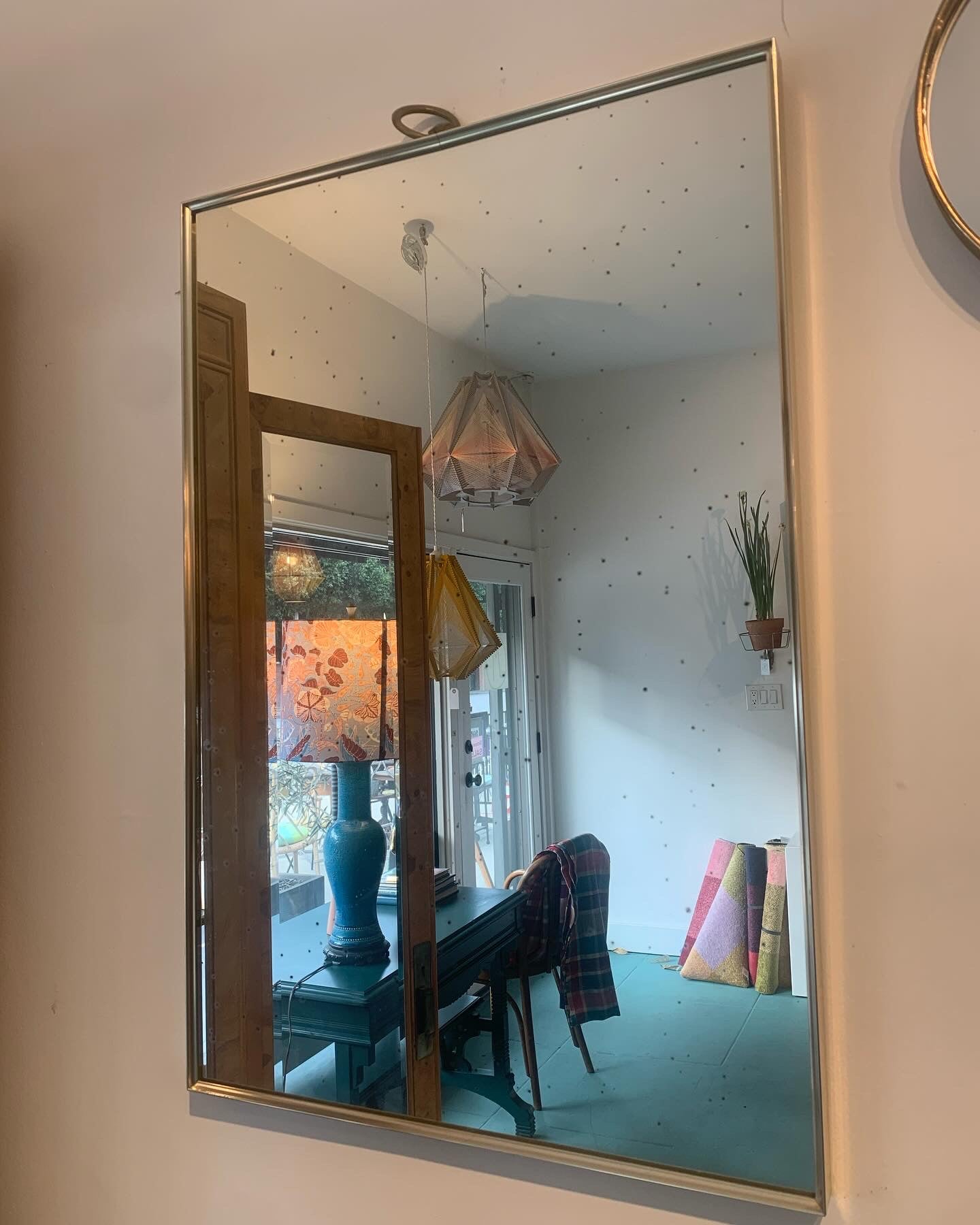 Large vintage brass framed mirror with antique patinated glass