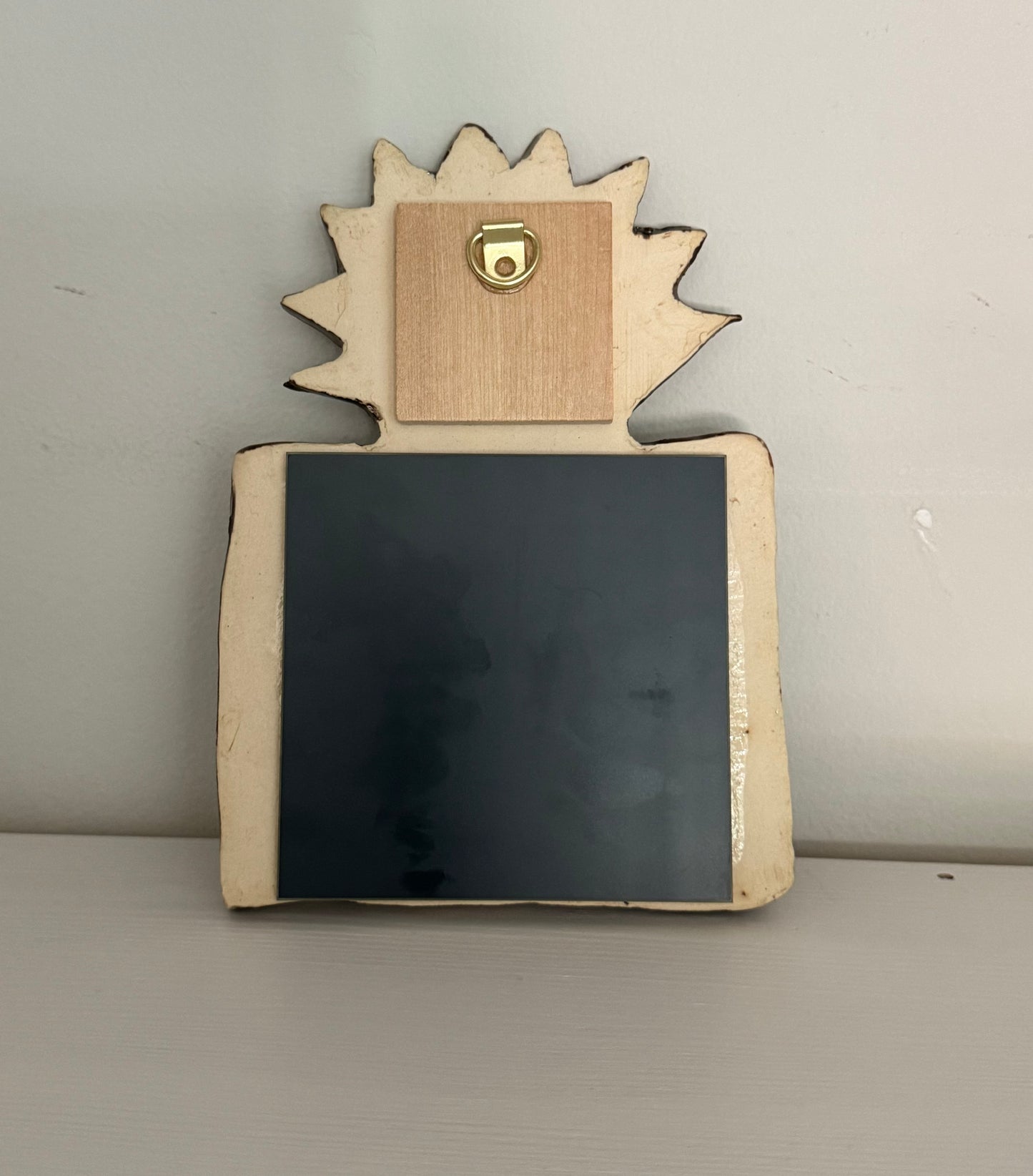 Sun-face ceramic mirror