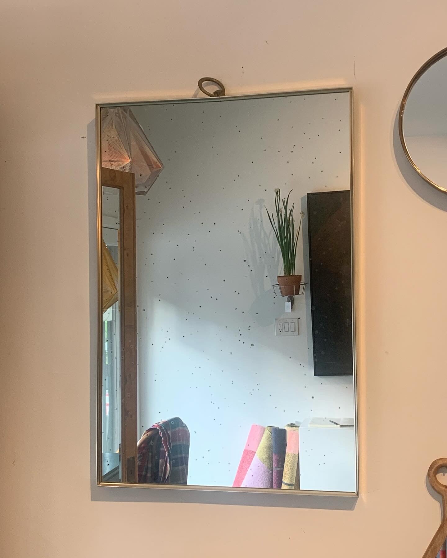 Large vintage brass framed mirror with antique patinated glass