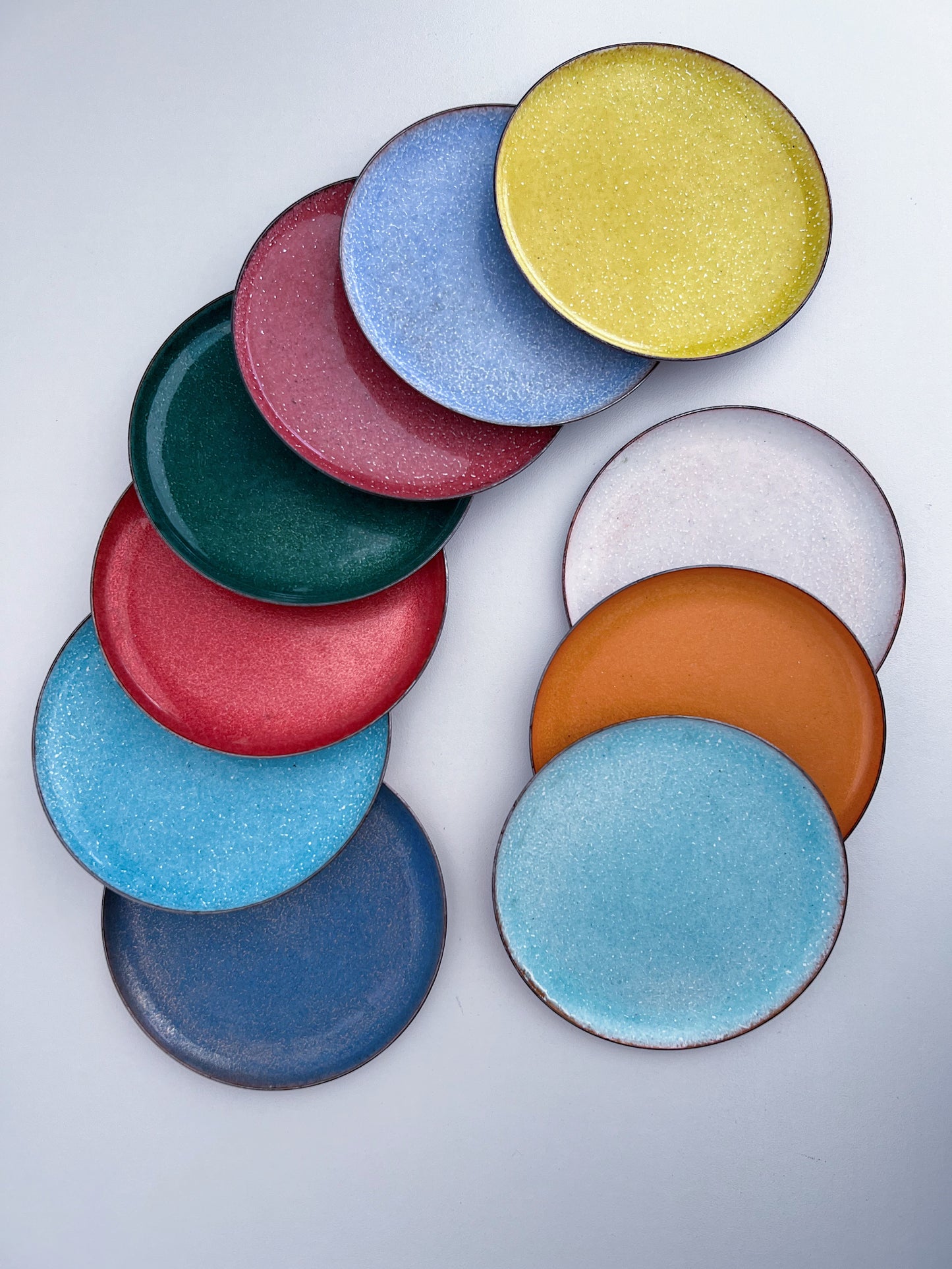 Set of 10 Mid-Century Modern Enamel and Copper Coasters
