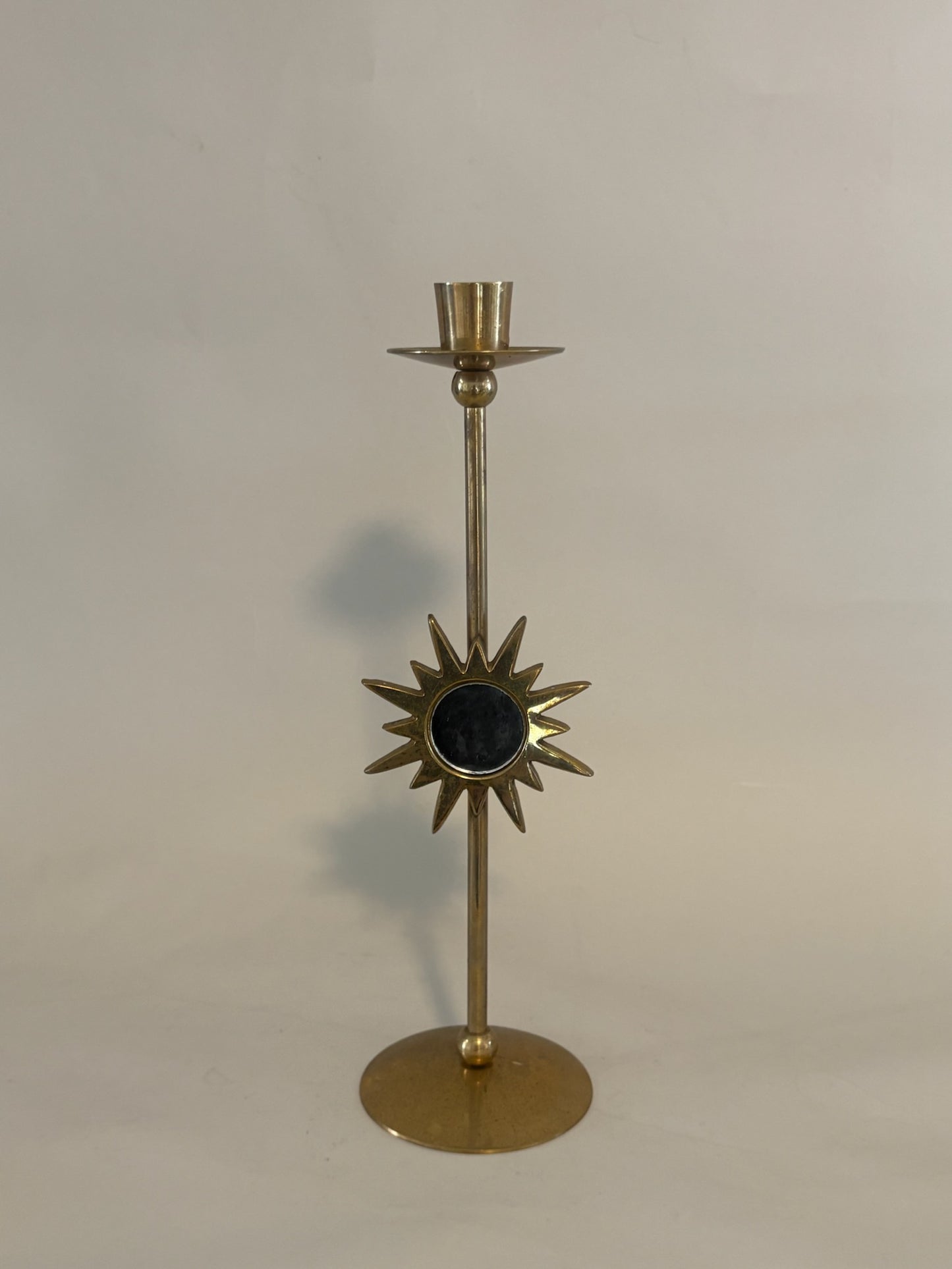 Mid-century brass candle holder with mirrored sunburst