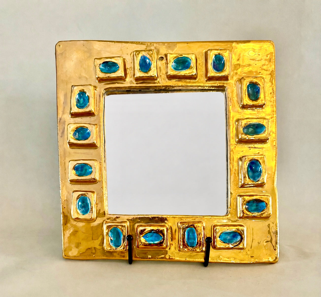 Small square ceramic mirror with gold luster glaze