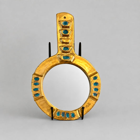 Small round ceramic mirror with gold luster glaze