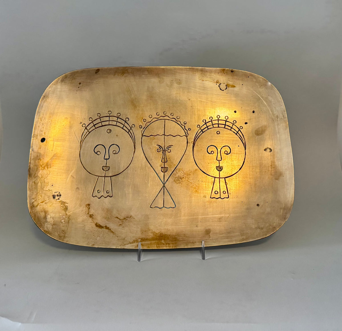 Vintage brass etched faces tray