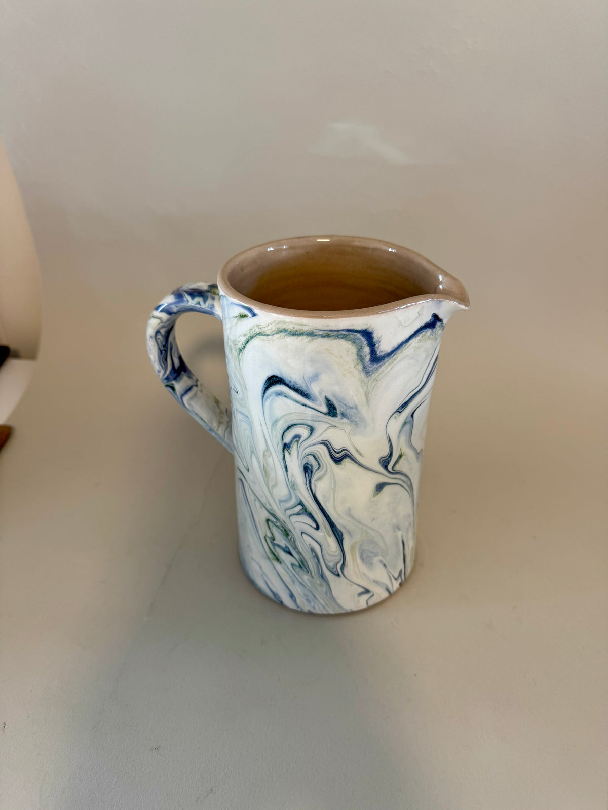Marbled pitcher indigo