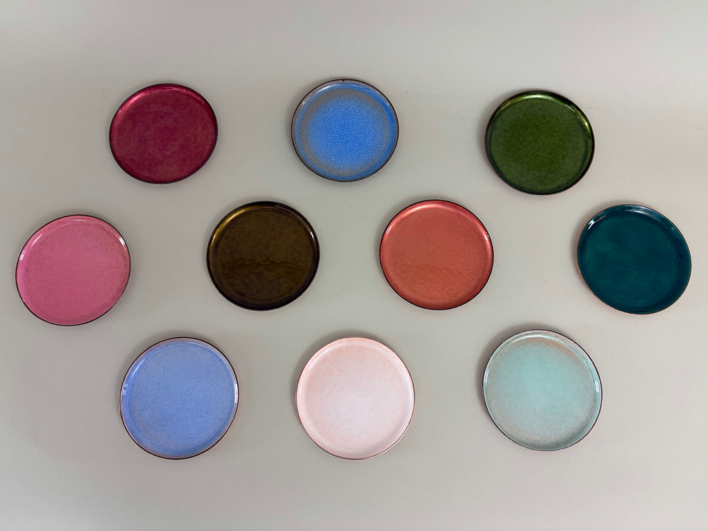 Set of 10 Mid Century Colored Enameled and Copper Coasters